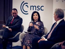 Katherina Reiche speaking on a panel at a Munich Security Conference event
